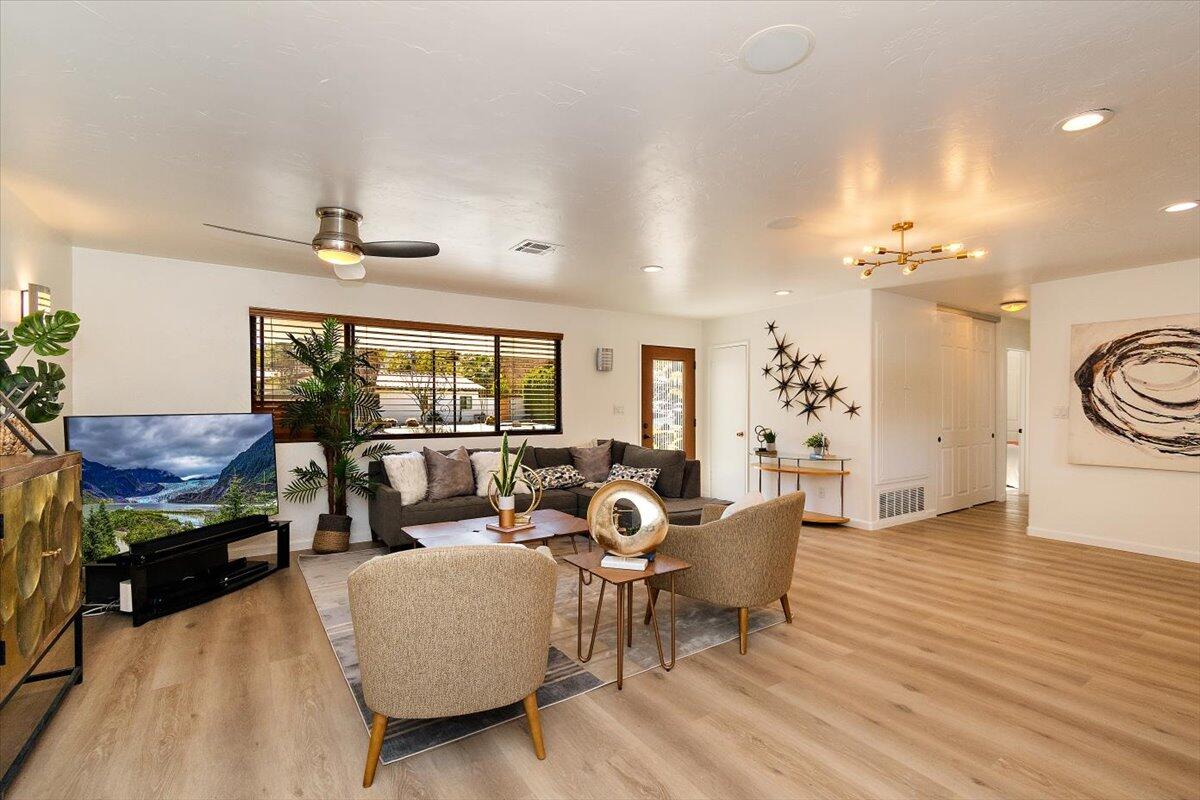 70140 Sun Valley Drive Rancho Mirage, CA 92270 - Photo 11 of 36 a living room with furniture and a large window