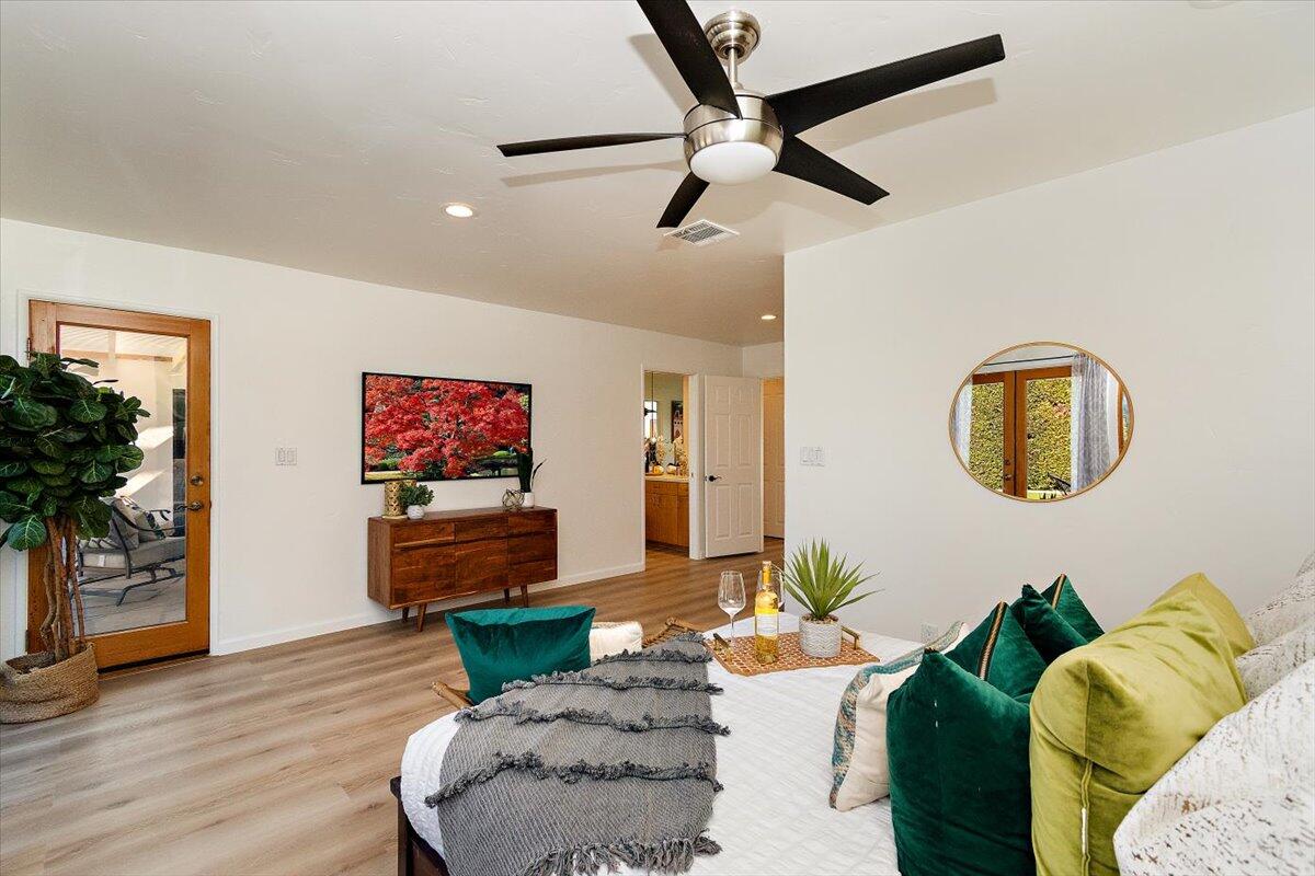 70140 Sun Valley Drive Rancho Mirage, CA 92270 - Photo 17 of 36 a living room with furniture and a wooden floor