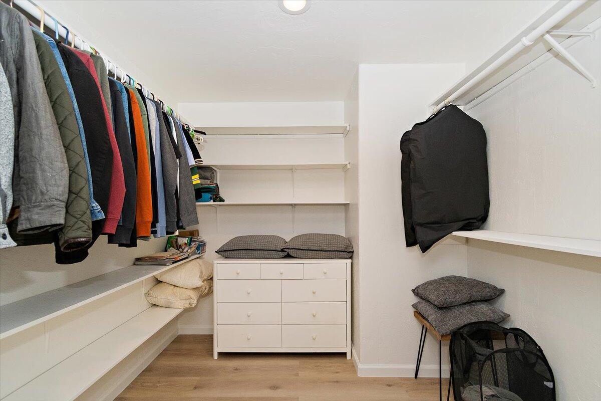 70140 Sun Valley Drive Rancho Mirage, CA 92270 - Photo 18 of 36 a view of walk in closet with clothes and shoes