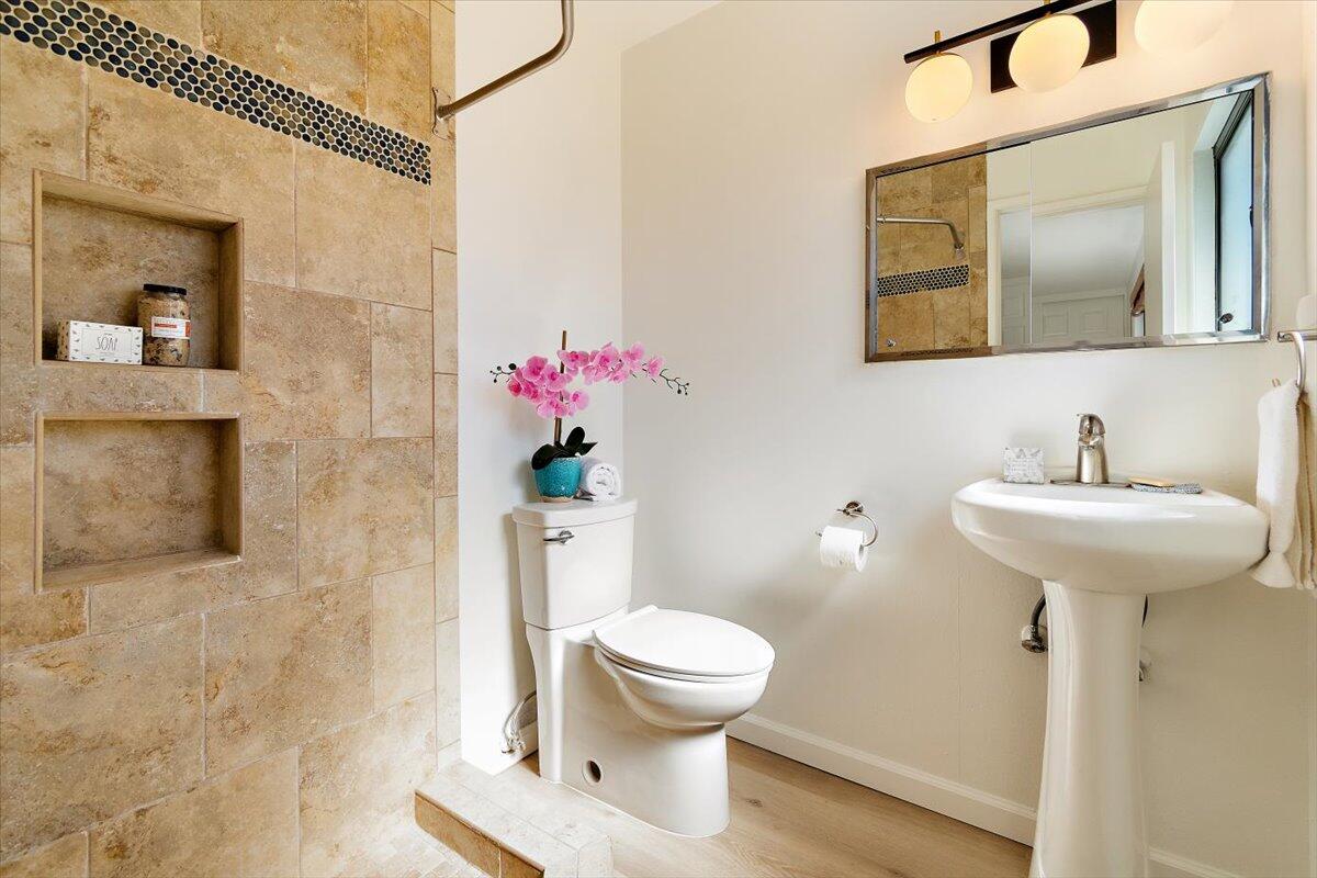 70140 Sun Valley Drive Rancho Mirage, CA 92270 - Photo 23 of 36 a bathroom with a toilet sink and mirror