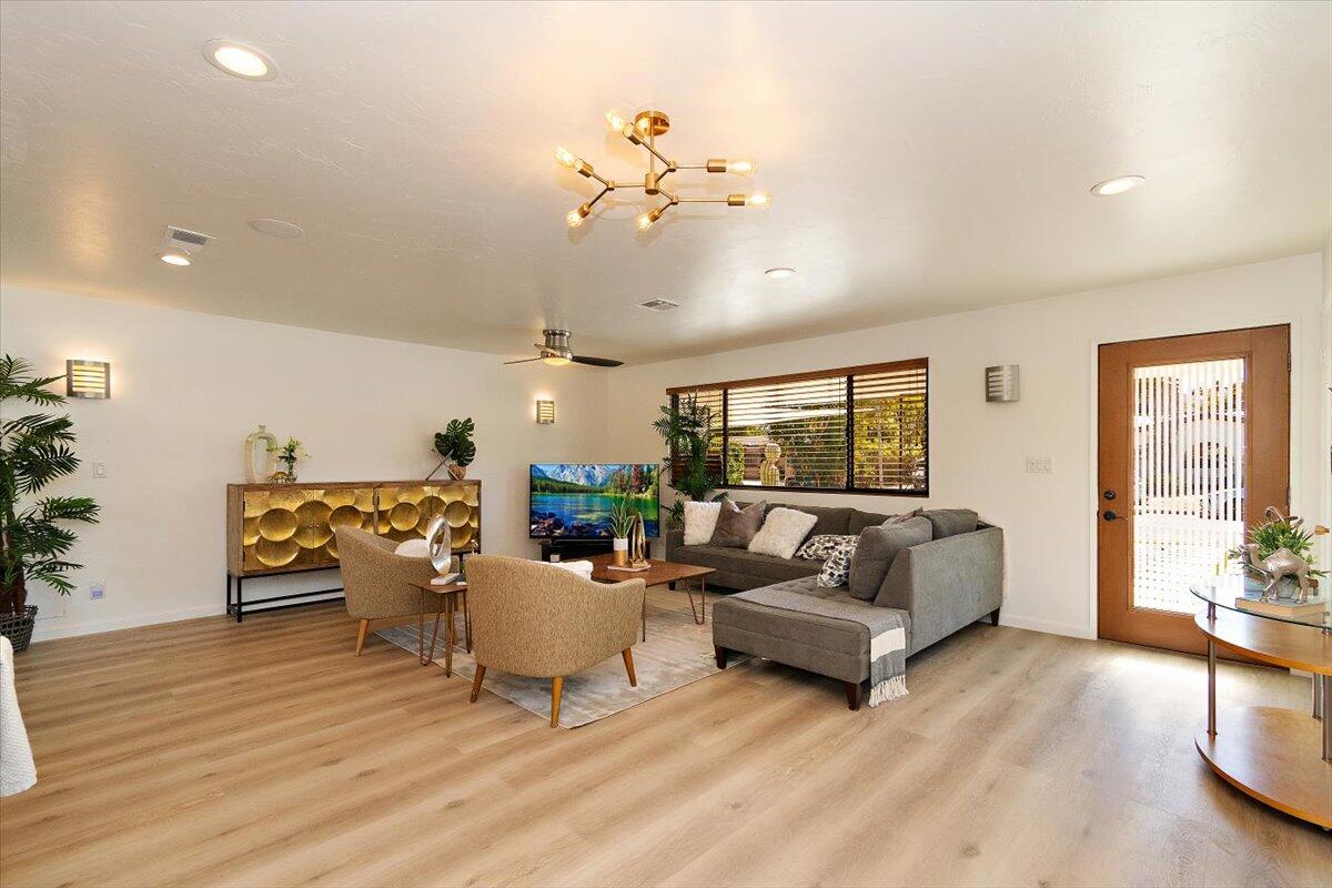 70140 Sun Valley Drive Rancho Mirage, CA 92270 - Photo 10 of 36 a living room with furniture and wooden floor
