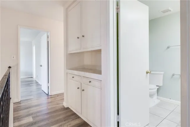a view of a bathroom from the hallway