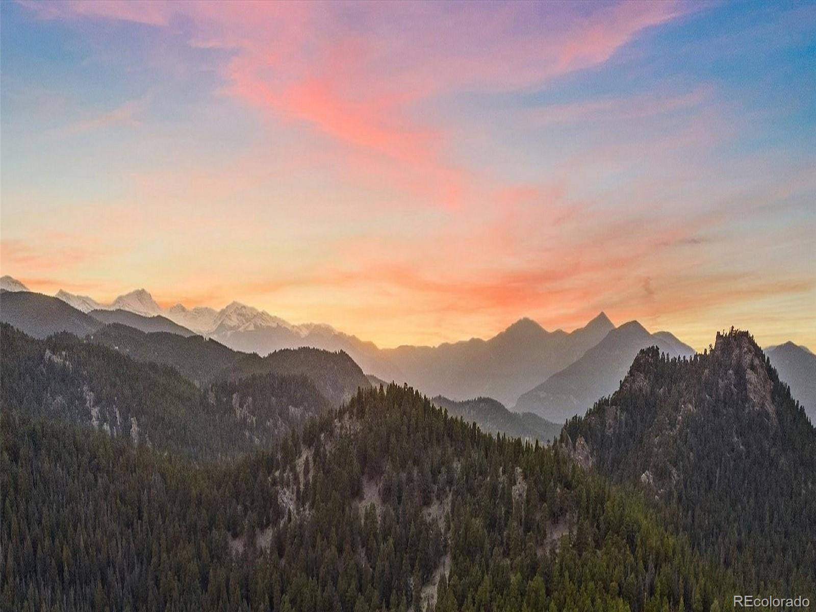 32024 Snowshoe Road Evergreen, CO 80439 - Photo 3 of 50 a view of mountains and valleys