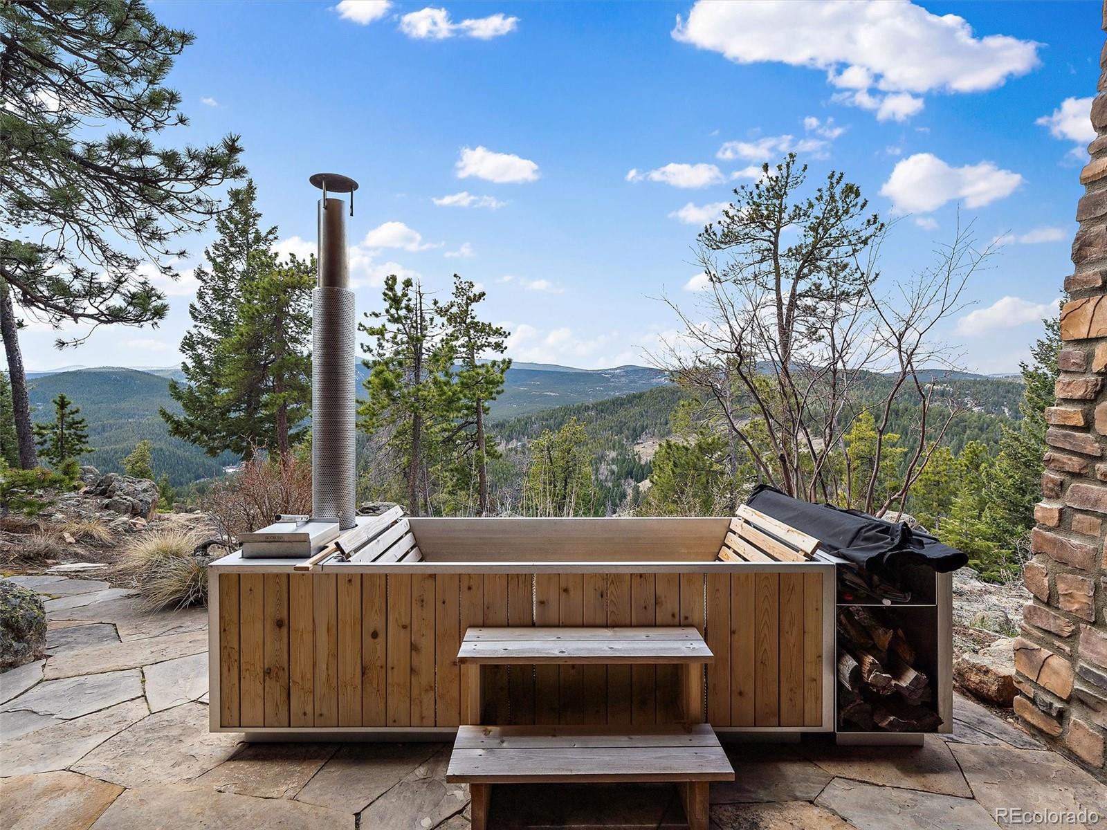 32024 Snowshoe Road Evergreen, CO 80439 - Photo 40 of 50 a view of outdoor space yard and patio