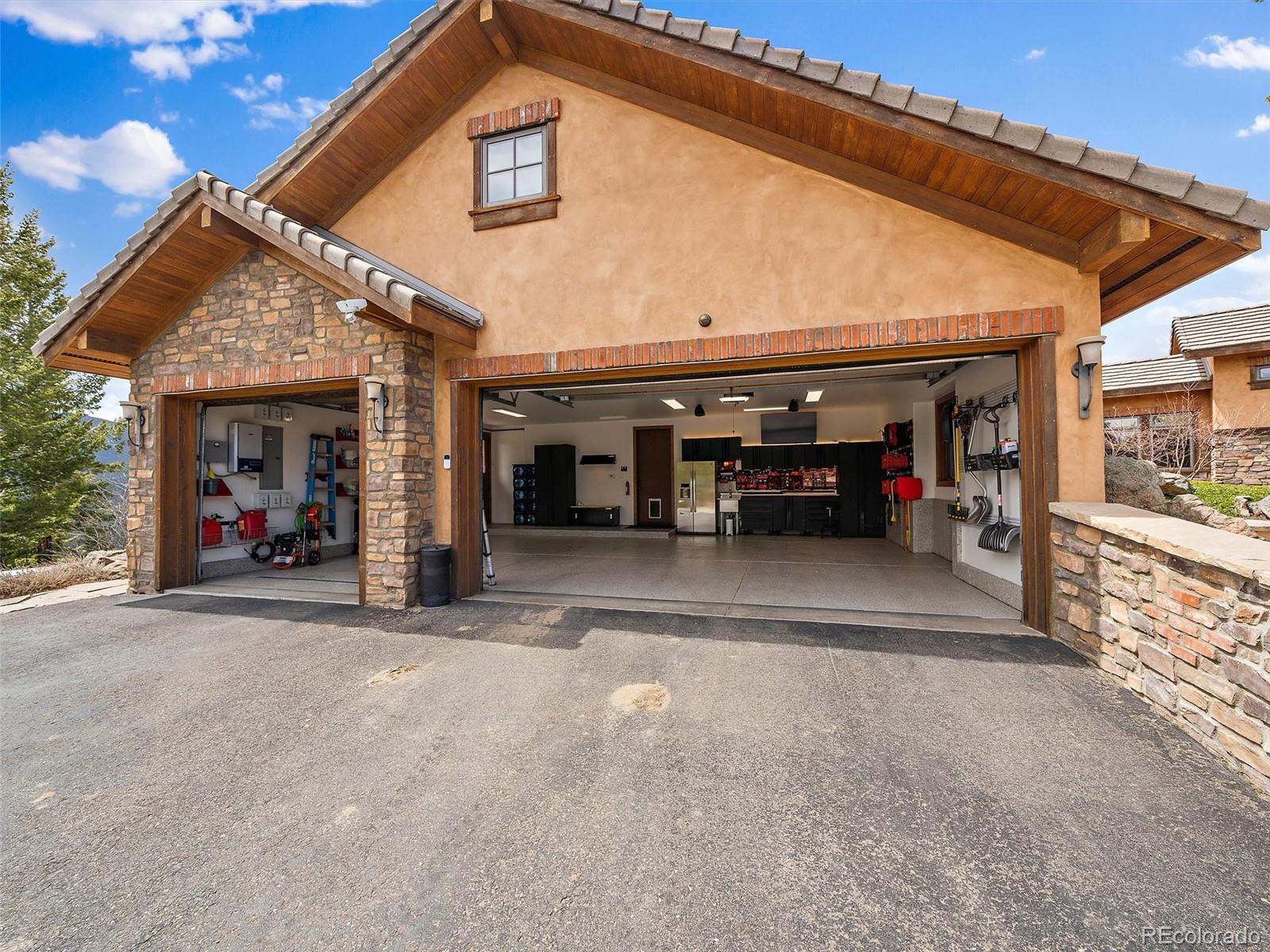 32024 Snowshoe Road Evergreen, CO 80439 - Photo 42 of 50 a view of a car garage