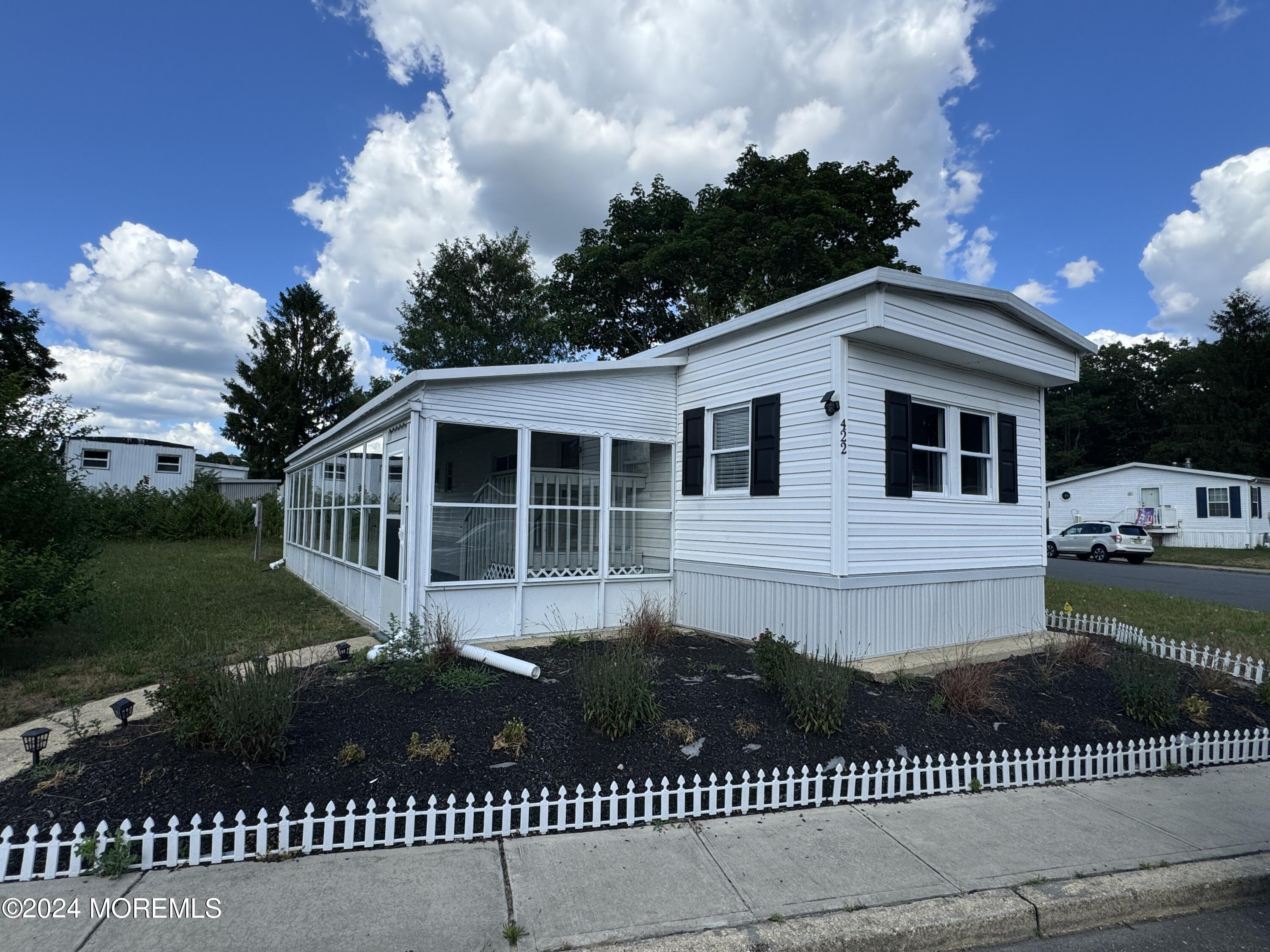 a view of a house with a garden