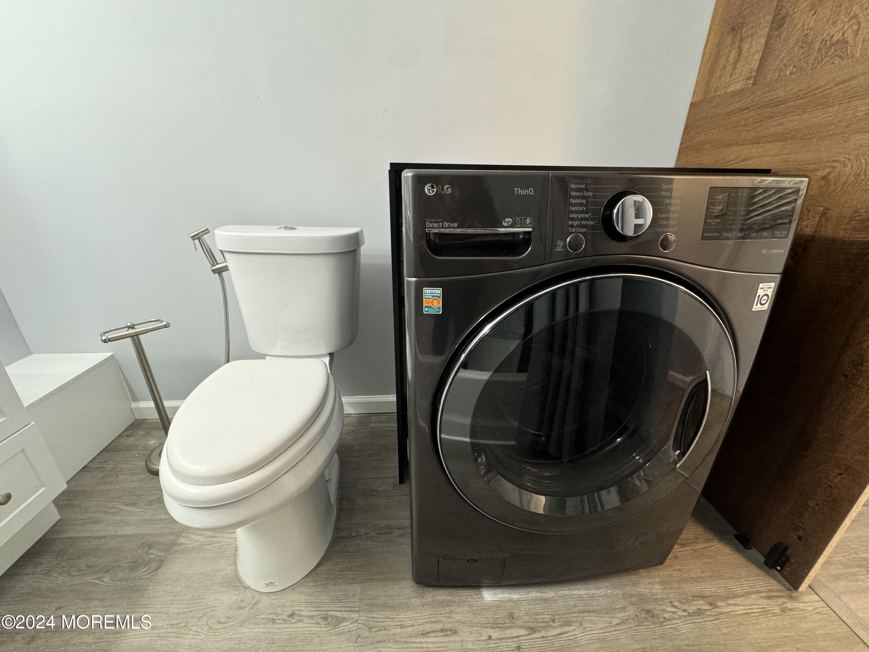 422 4th Street Jackson, NJ 08527 - Photo 11 of 17 a utility room with dryer and washer