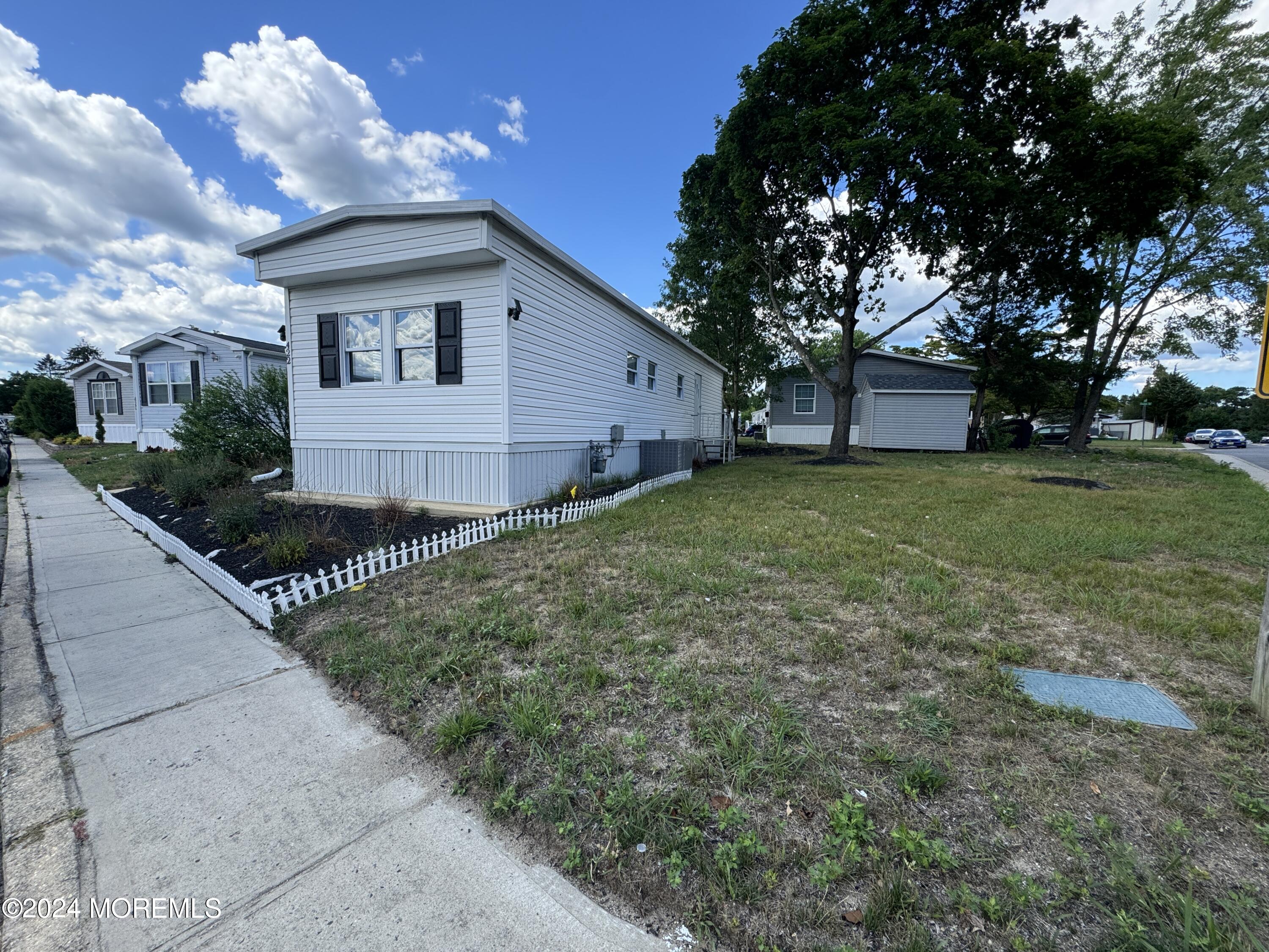 422 4th Street Jackson, NJ 08527 - Photo 2 of 17 a view of a house with a yard