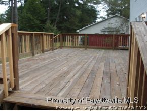 4938 Black Bridge Road Parkton, NC 28371 - Photo 15 of 17 a view of wooden deck