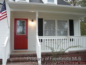 4938 Black Bridge Road Parkton, NC 28371 - Photo 2 of 17 a view of a door and a window