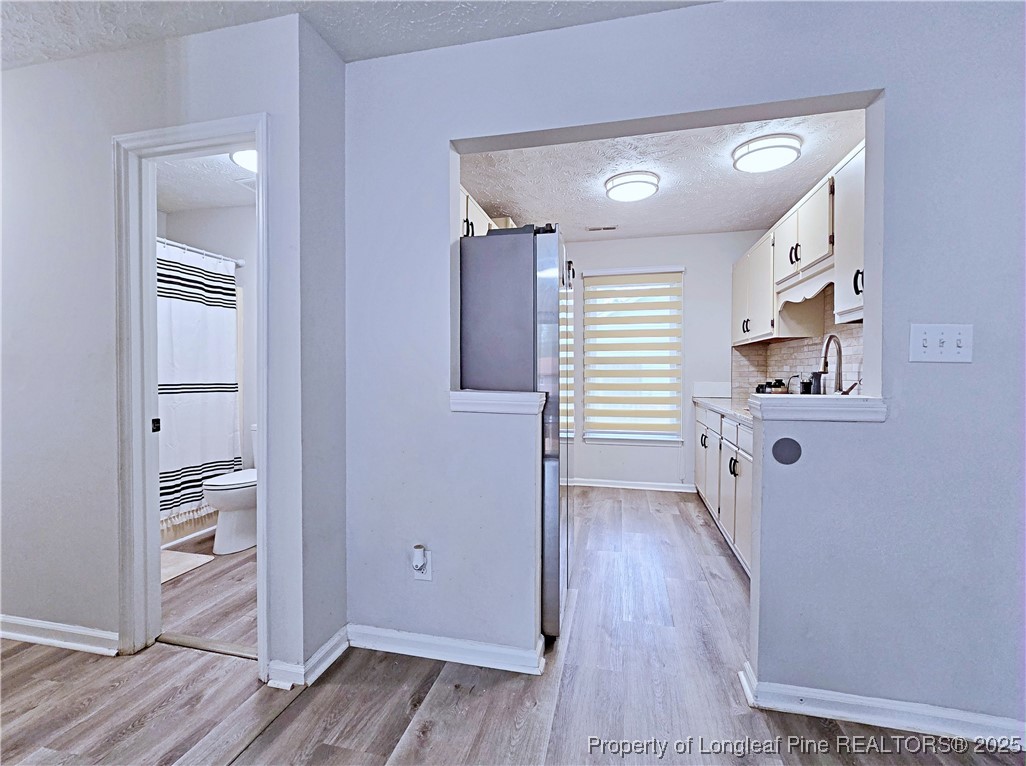 5309 Tory Hill Road Hope Mills, NC 28348 - Photo 12 of 45 wooden floor in an empty room