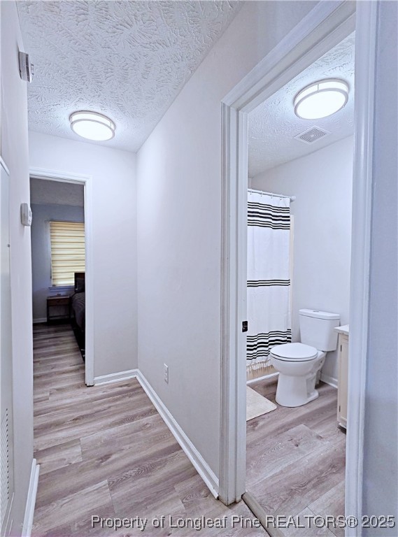 5309 Tory Hill Road Hope Mills, NC 28348 - Photo 17 of 45 a bathroom with a sink and a toilet