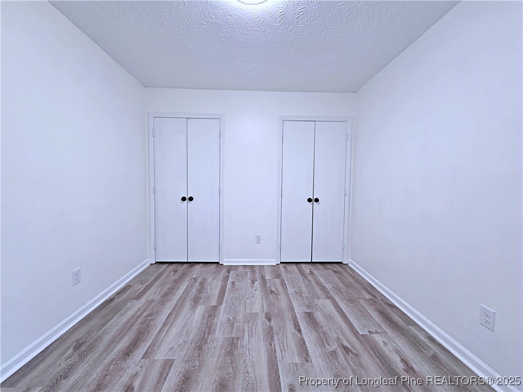 5309 Tory Hill Road Hope Mills, NC 28348 - Photo 26 of 45 a view of room with wooden floor