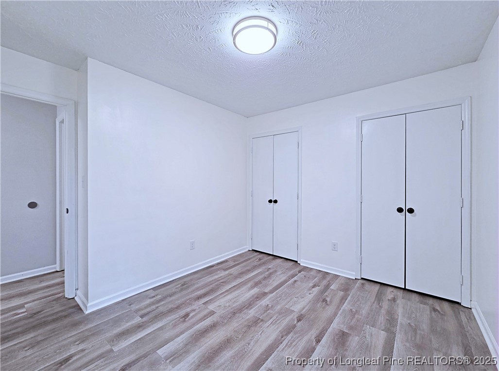 5309 Tory Hill Road Hope Mills, NC 28348 - Photo 27 of 45 a view of room with wooden floor