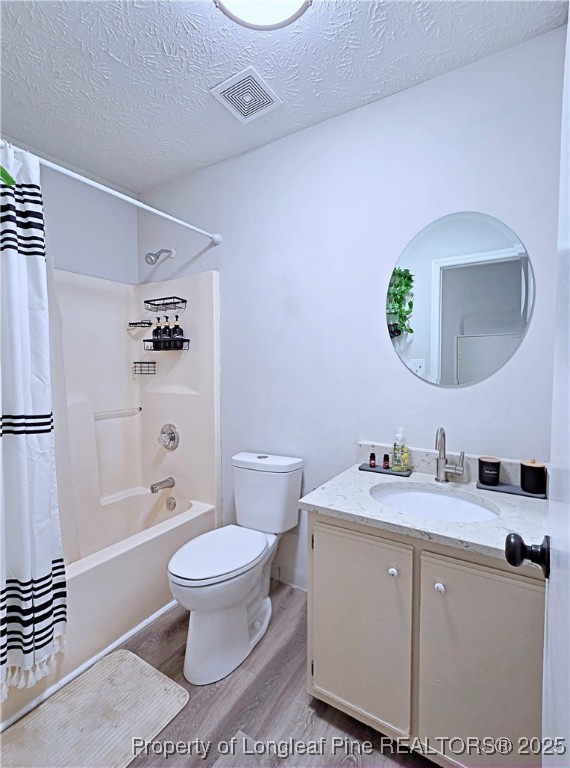 5309 Tory Hill Road Hope Mills, NC 28348 - Photo 29 of 45 a bathroom with a toilet sink and mirror