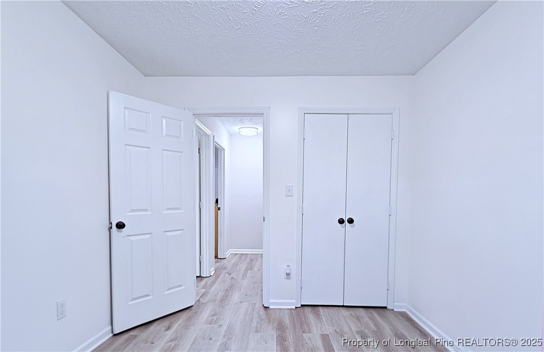 5309 Tory Hill Road Hope Mills, NC 28348 - Photo 31 of 45 a view of room with hardwood floor