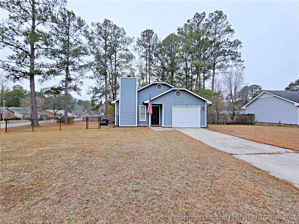 5309 Tory Hill Road Hope Mills, NC 28348 - Photo 33 of 45 a view of outdoor space yard and tree
