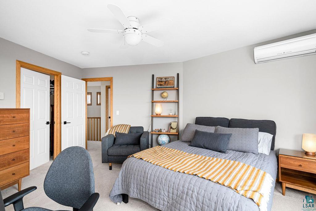 4856 Kingston Street Duluth, MN 55804 - Photo 27 of 88 Bedroom featuring light gray walls and plush carpeting