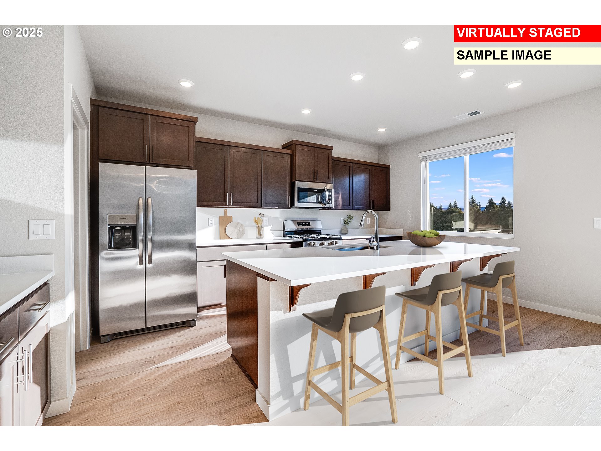 847 Glade Avenue Forest Grove, OR 97116 - Photo 5 of 20 a kitchen with kitchen island granite countertop a refrigerator and a stove top oven