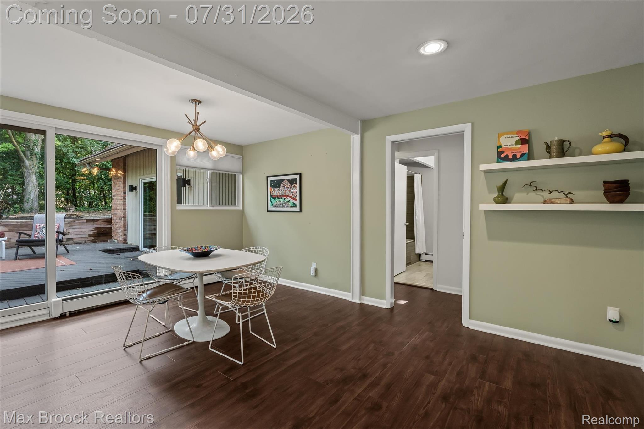 29630 Sugar Spring Road Farmington, MI 48334 - Photo 11 of 41 Dining area featuring LVF flooring, recessed lighting, and a modern chandelier