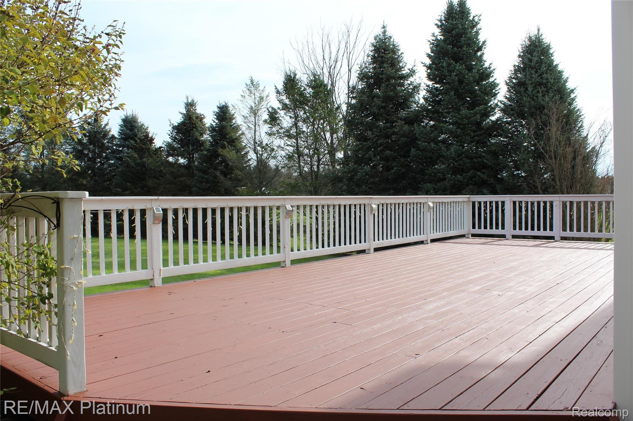 1756 Argentine Road Howell, MI 48843 - Photo 7 of 46 Spaced back deck overlooking scenic back yard