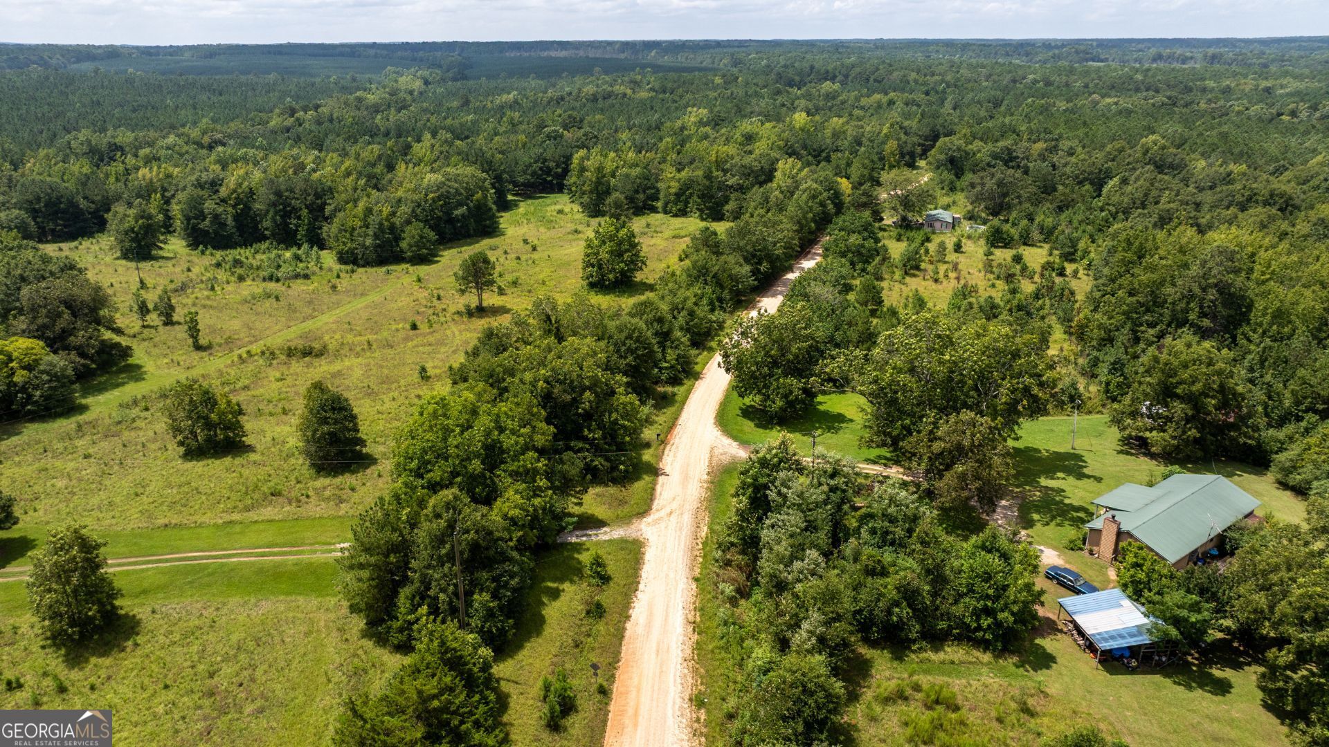 0 Frank Smith Road Norwood, GA 30821 - Photo 8 of 17 a view of a lake with a houses