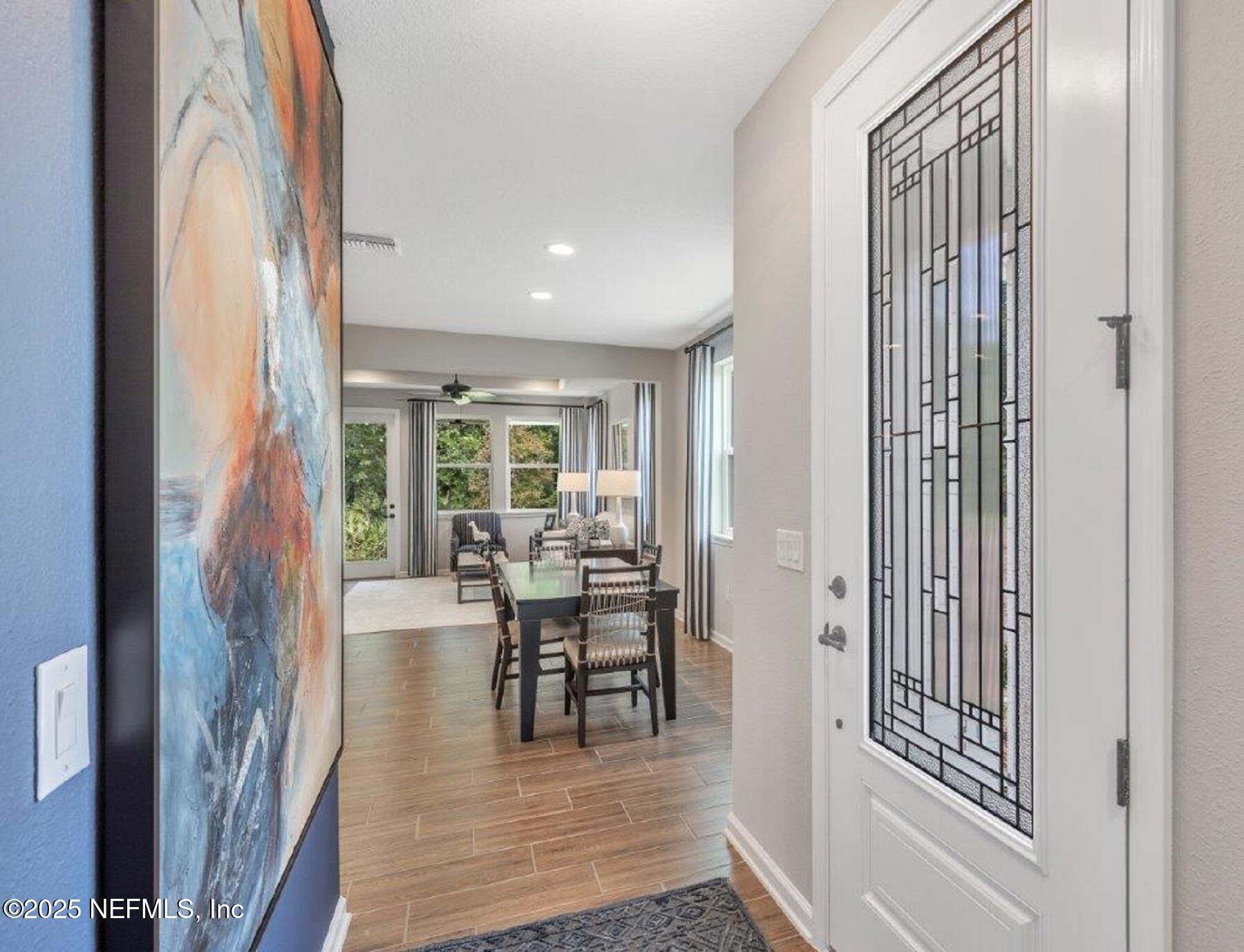 1000 Brk Frst Drive St. Augustine, FL 32092 - Photo 2 of 14 a view of a livingroom with furniture and floor to ceiling window