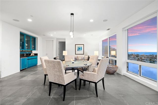 a view of a backyard with sitting area