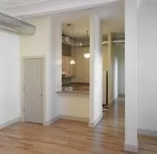 a view of a bathroom with a glass shower door