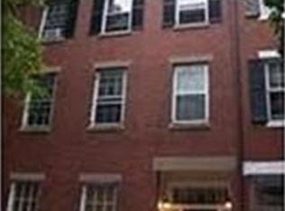 11 Church Street, Unit 5 Boston, MA 02116 - Photo 5 of 7 a couple of table and chair in front of building