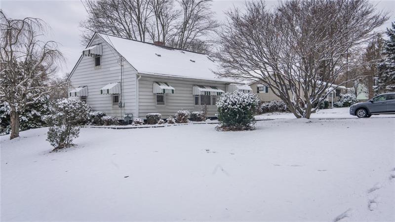 49 George Jr Road Grove City, PA 16127 - Photo 2 of 25 Nicely landscaped front yard sits back from the road and includes a paved driveway with turnaround