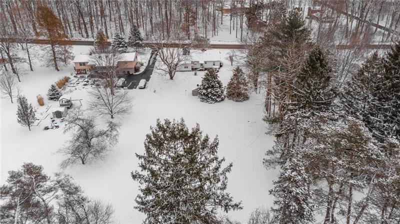 49 George Jr Road Grove City, PA 16127 - Photo 3 of 25 The aerial view showcases the one acre lot and abundance of trees!