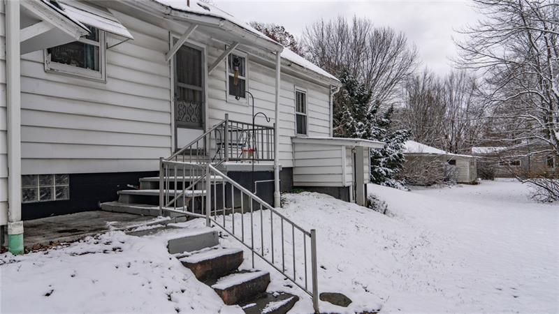 49 George Jr Road Grove City, PA 16127 - Photo 22 of 25 The garage is adjacent to the house, but has access to the kitchen from the covered back porch.