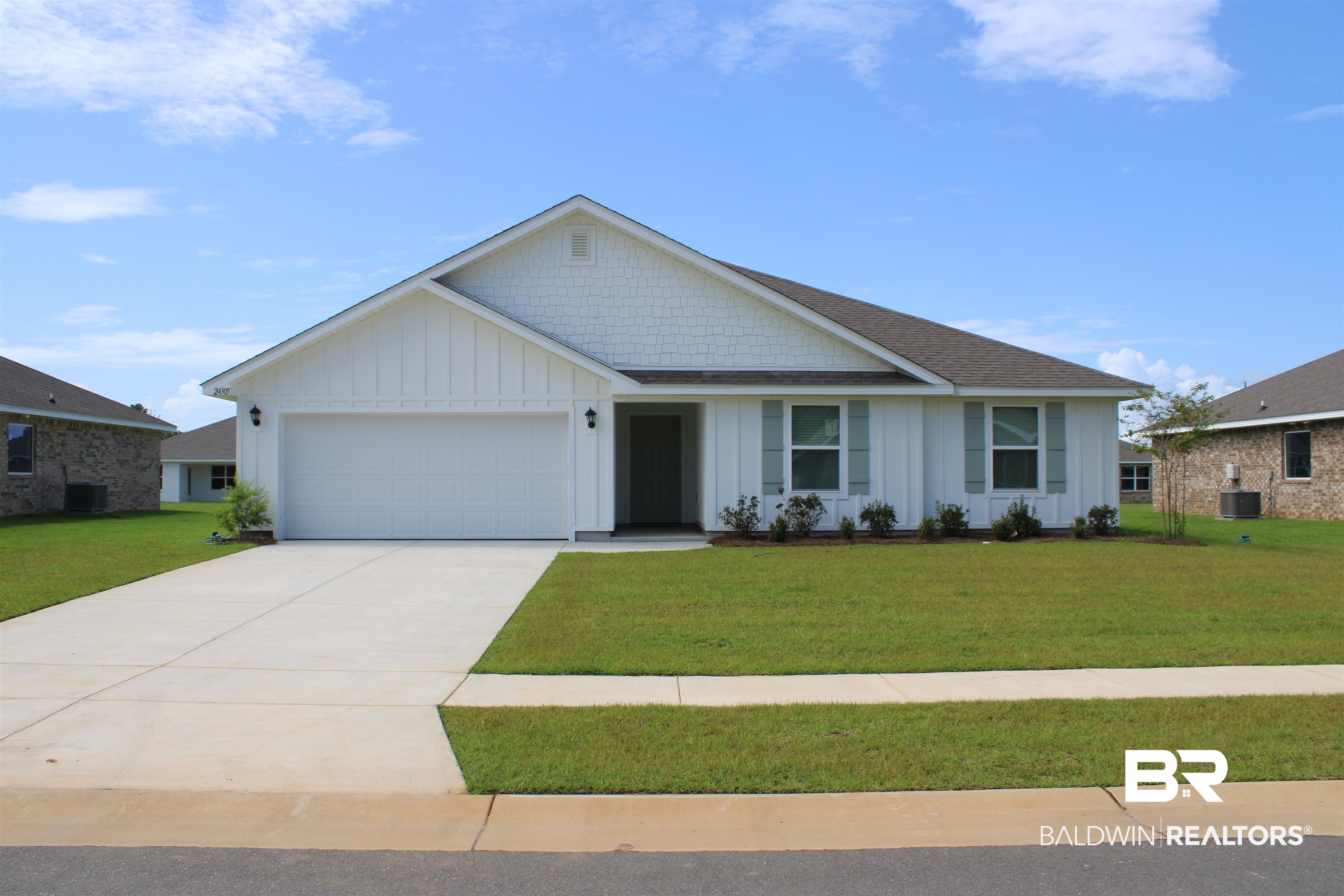 24305 Ringneck Loop Elberta, AL 36530 - Photo 1 of 2 Ranch-style house featuring cooling unit, a garage, and a front yard