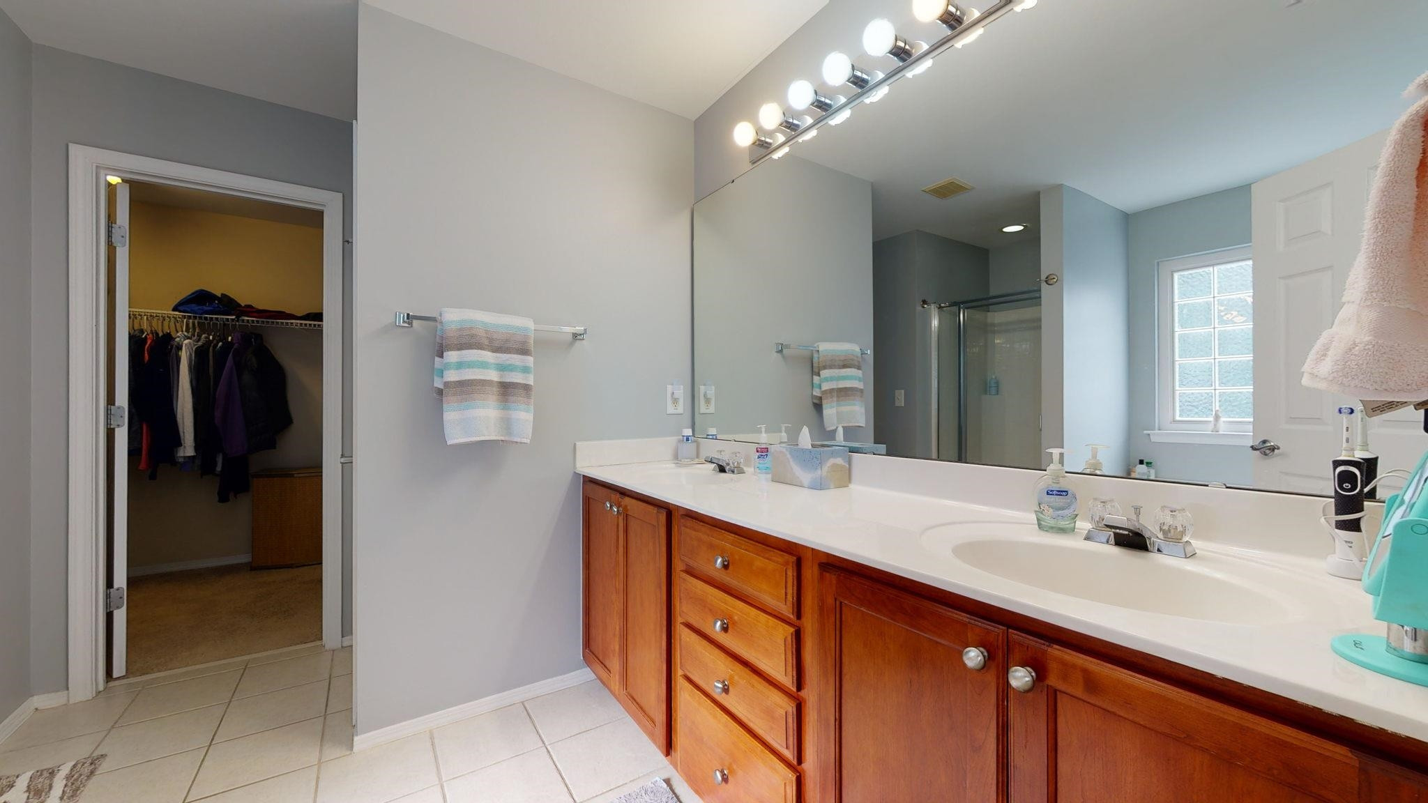 8405 Stoneyard Place Raleigh, NC 27613 - Photo 16 of 24 Master bathroom has a double vanity, soaking tub, glass shower and walk in closet! Master Bathroom