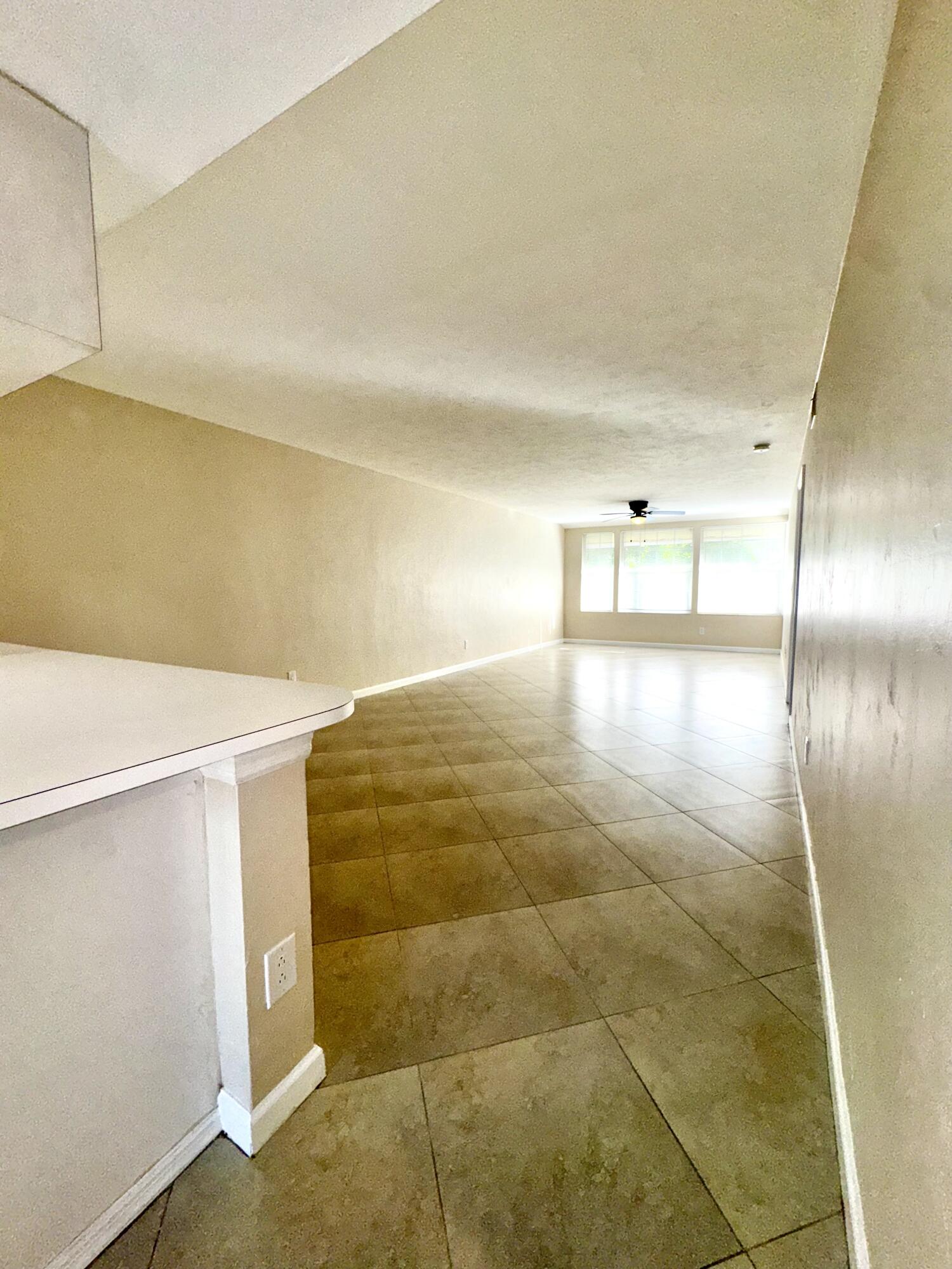 1708 Palm Beach Trace Drive Royal Palm Beach, FL 33411 - Photo 2 of 13 a view of an empty room