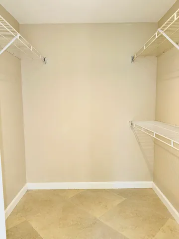 a bathroom with a shower sink and toilet