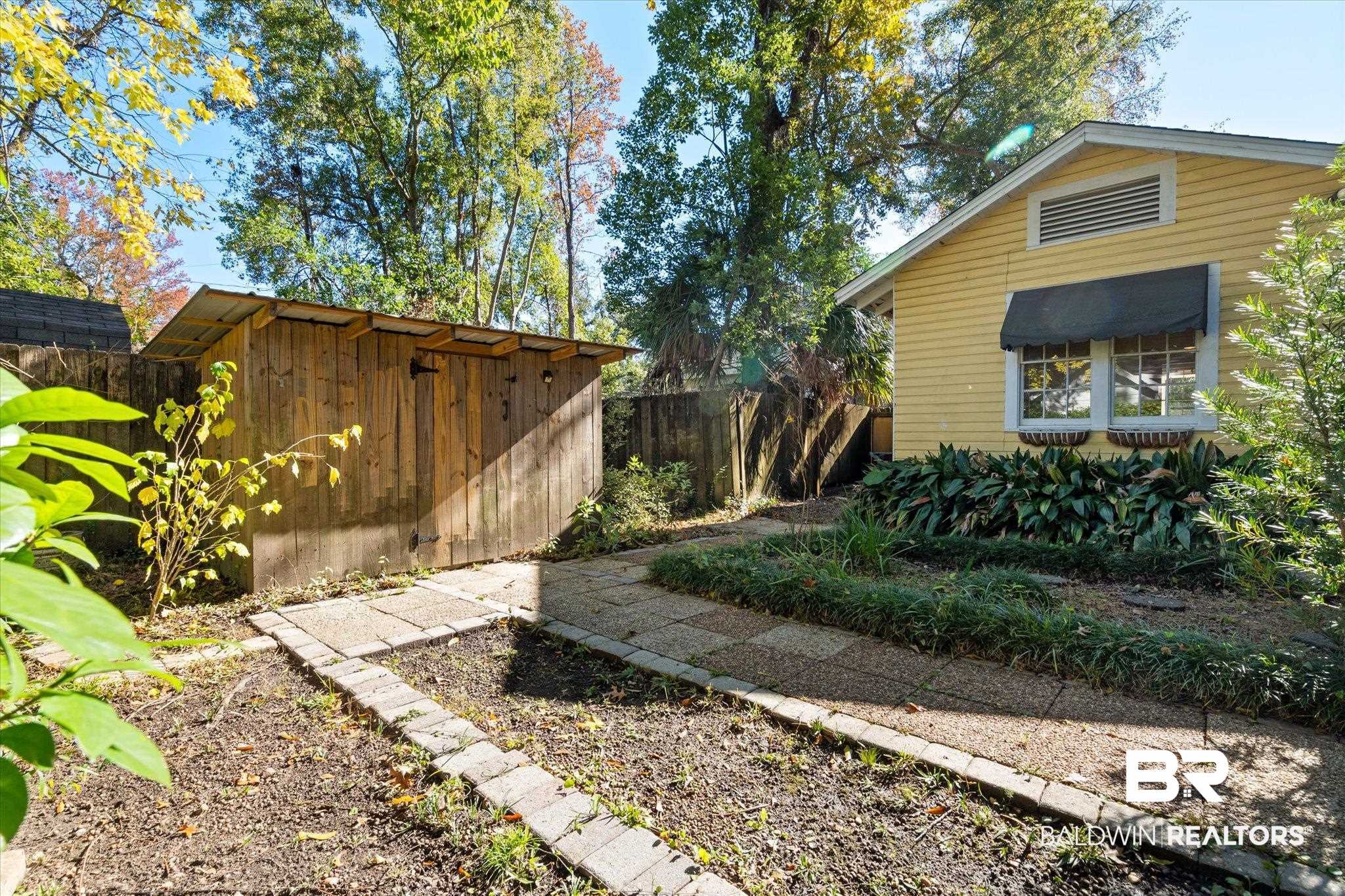 1220 Elmira Street Mobile, AL 36604 - Photo 17 of 20 View of yard with a storage shed