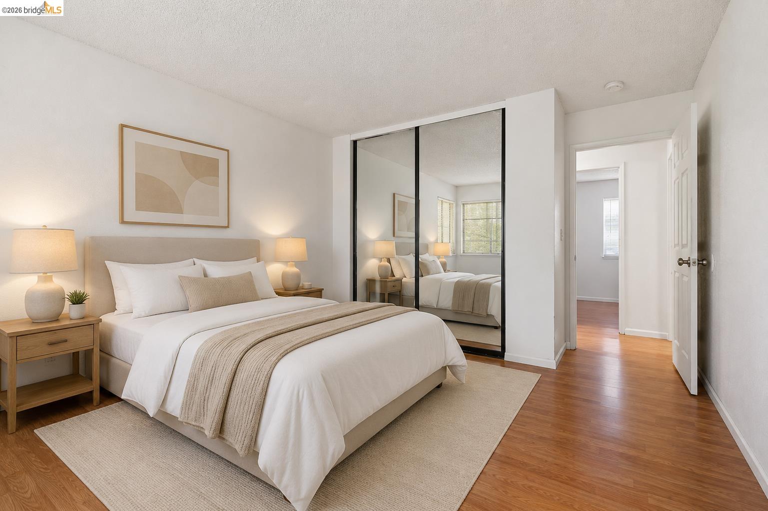 1151 Chadwick Circle Bay Point, CA 94565 - Photo 13 of 23 Bedroom featuring wood-finish flooring, mirrored closet doors, and recessed lighting