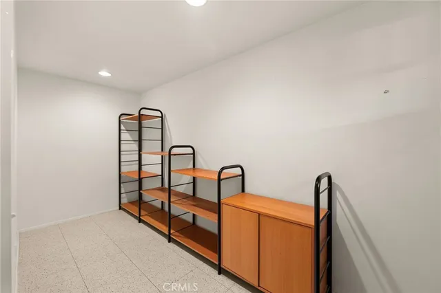 a view of a swimming pool with an outdoor space and seating area