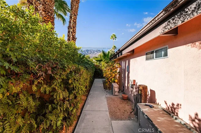 an aerial view of a house with a garden