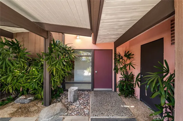 a view of a room with windows