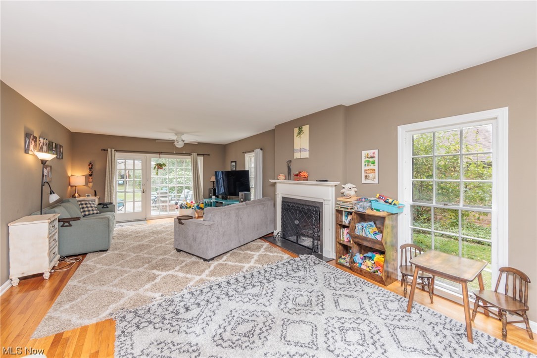 2525 Warwick Road Cleveland, OH 44120 - Photo 4 of 22 Hardwood floored living room featuring a wealth of natural light and ceiling fan