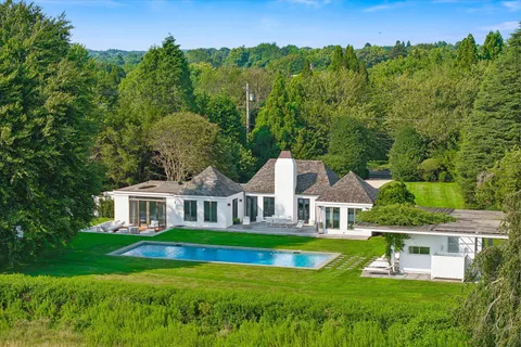 a view of a house with a big yard
