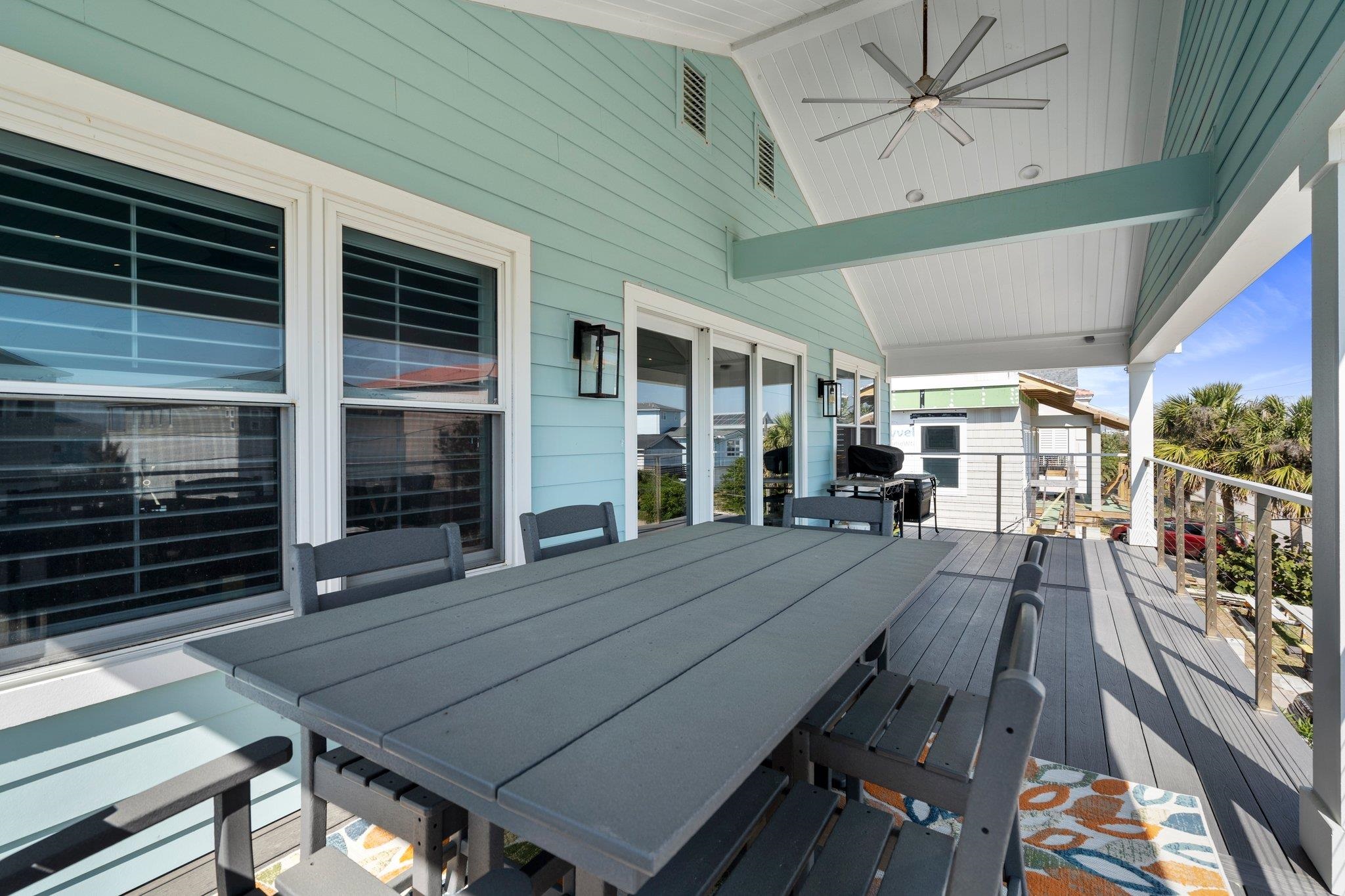 5497 Pelican Way St. Augustine, FL 32080 - Photo 21 of 49 a view of a patio with a table and chairs