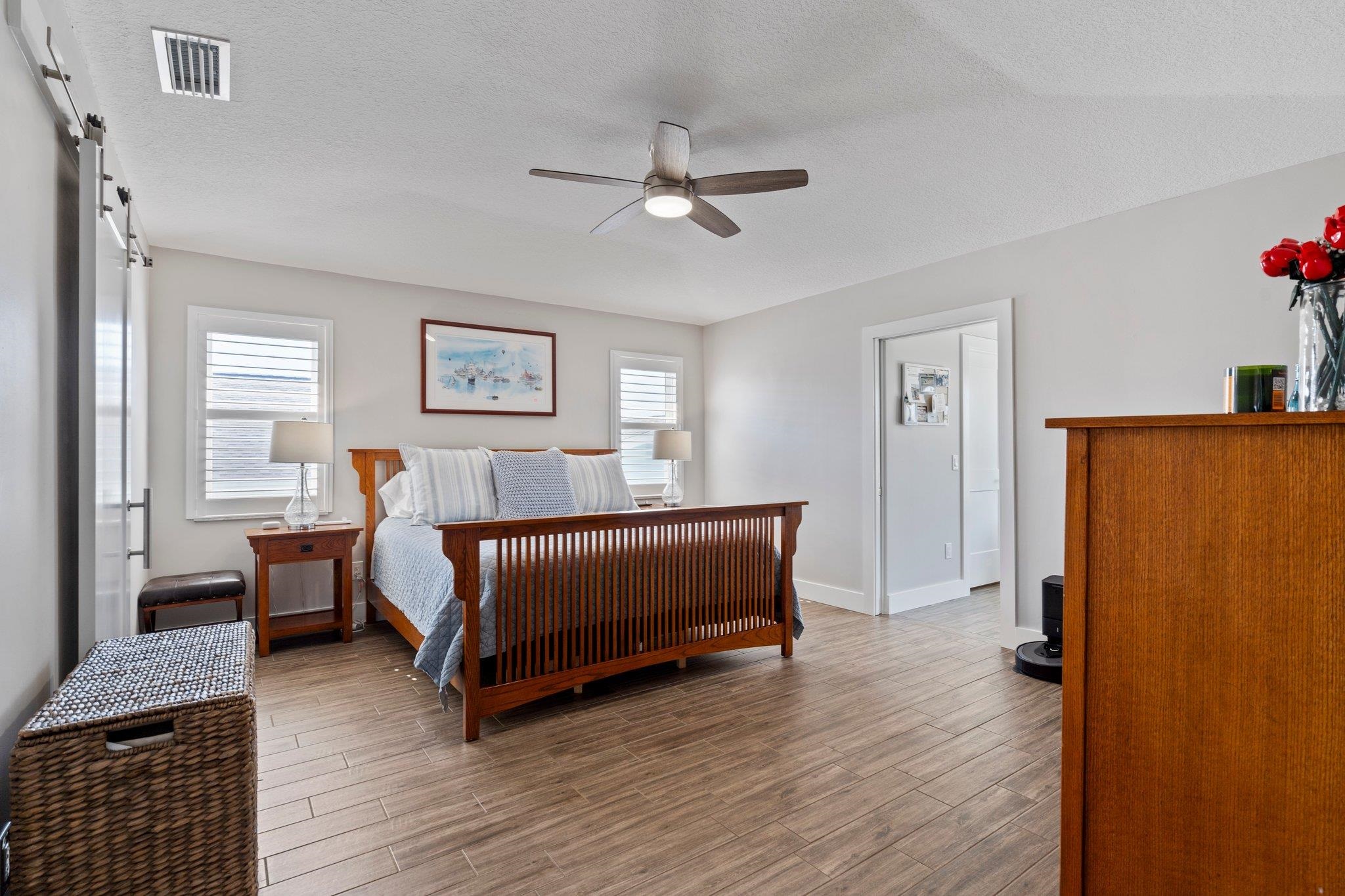 5497 Pelican Way St. Augustine, FL 32080 - Photo 22 of 49 a bedroom with a bed and a window