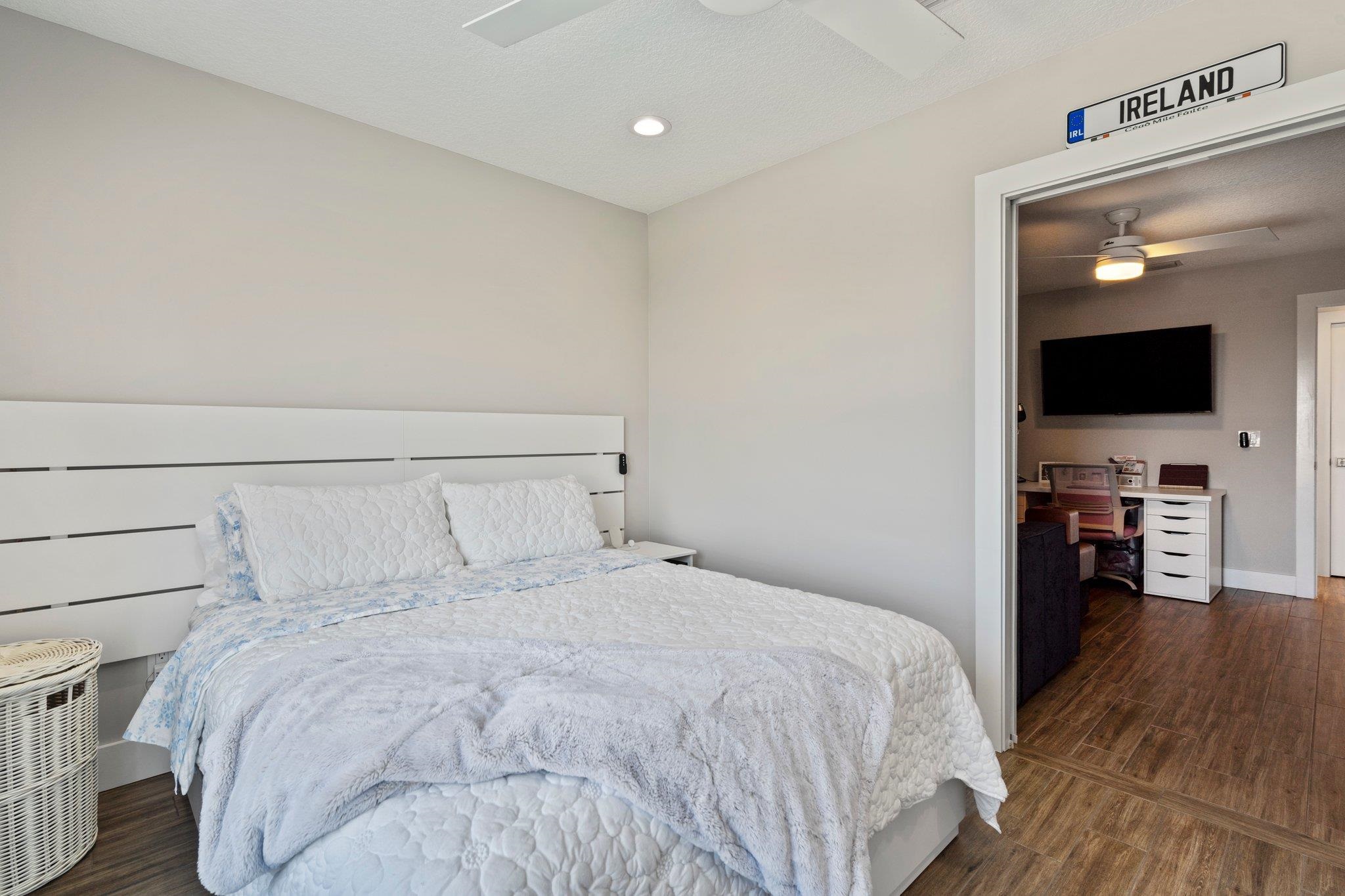 5497 Pelican Way St. Augustine, FL 32080 - Photo 29 of 49 a bedroom with a bed and a television