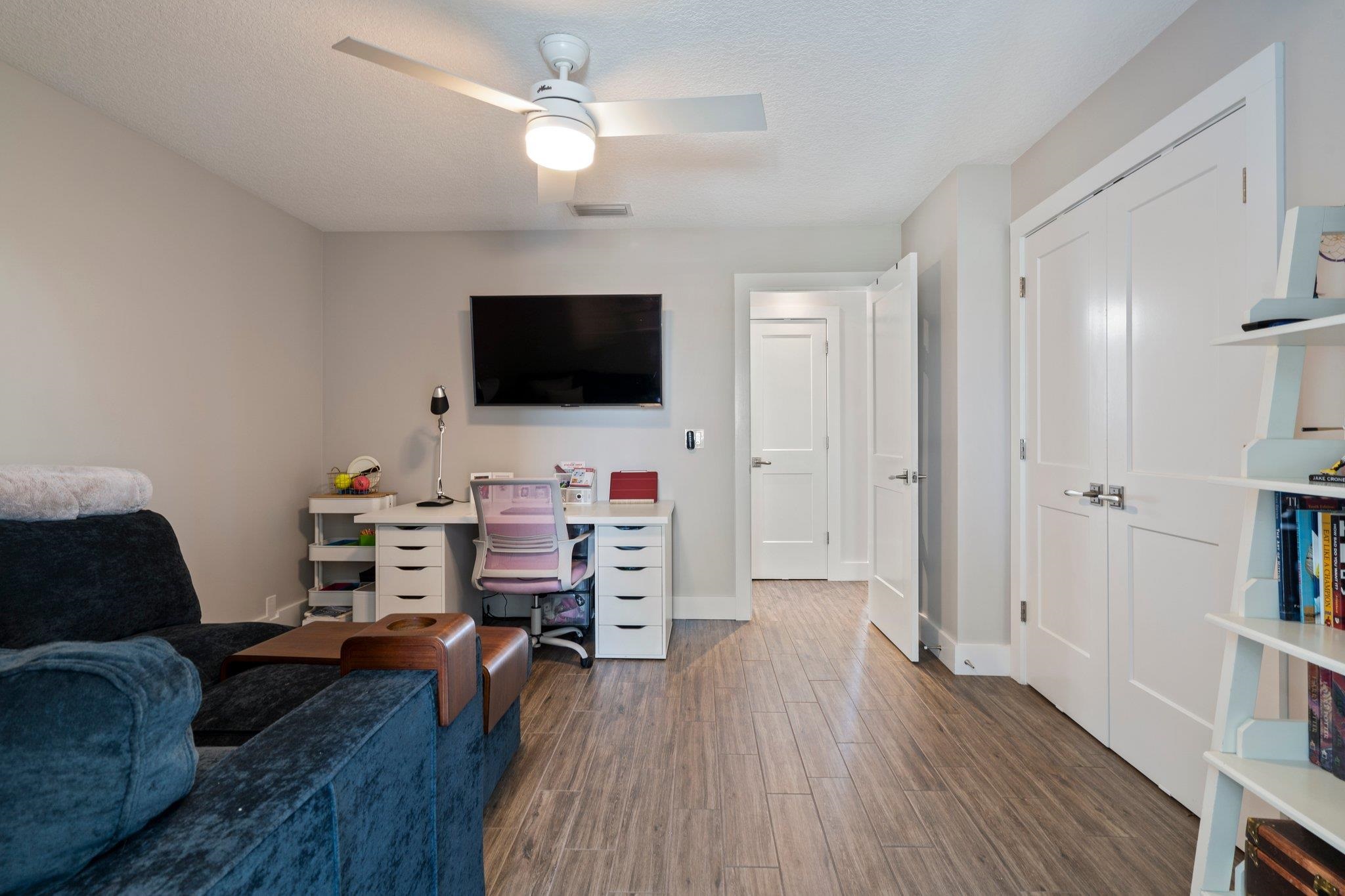 5497 Pelican Way St. Augustine, FL 32080 - Photo 30 of 49 a view of a livingroom with furniture and a flat screen tv