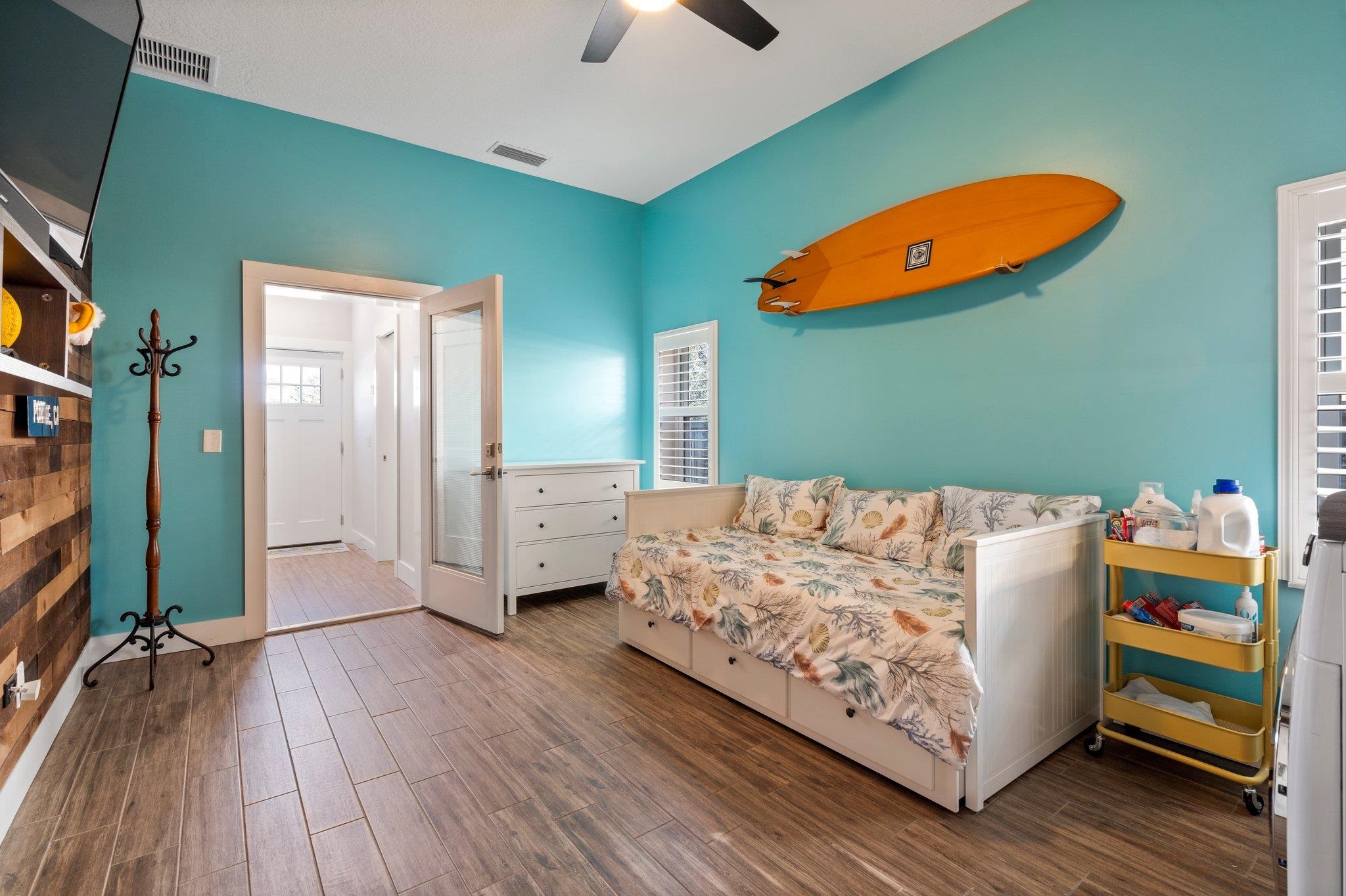5497 Pelican Way St. Augustine, FL 32080 - Photo 37 of 49 a living room with a bed and a ceiling fan