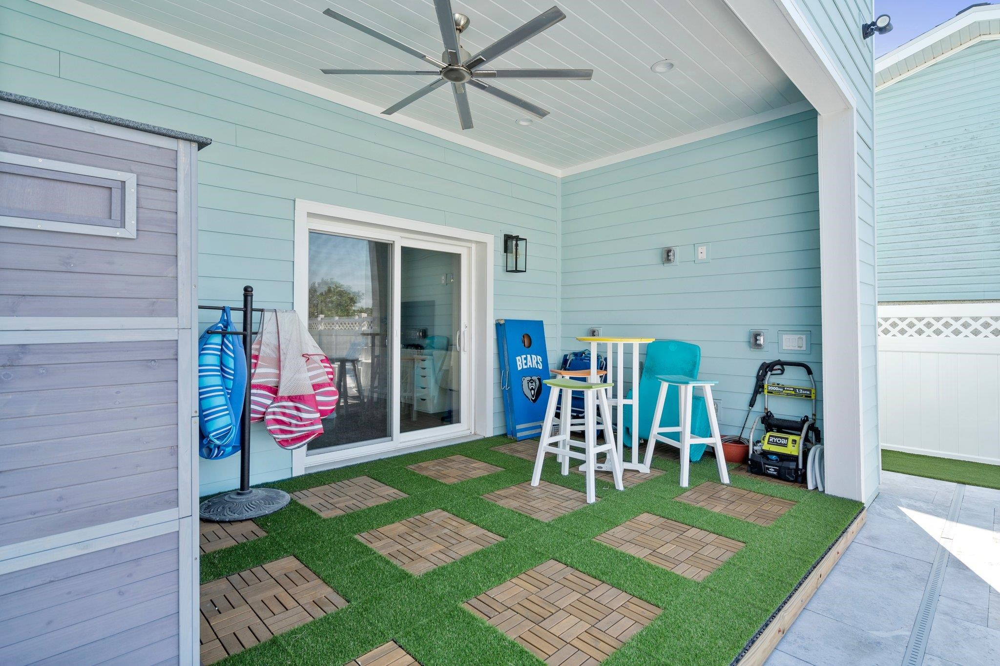 5497 Pelican Way St. Augustine, FL 32080 - Photo 42 of 49 a view of a porch with a table and chairs